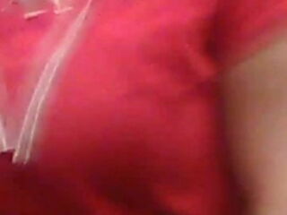 She was wearing a tan shirt with a wide v-neck with mad cleavage but had strings crossing and her tits were squeezing through the strings. There was too many people around and someone would have notic