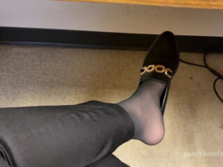 Natalie works at a medical office and today she's wearing the same off black color pantyhose from the previous video. She dangled her flats while all of her colleagues were around.