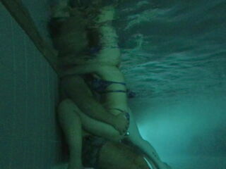 Caught this couple underwater at night in the public pool. They were so close to me I could hear them breathe. I didn't look at them, but my camera did. I think they had sex. His dick was unseen.