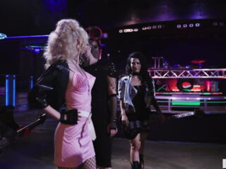 Two lesbian rival rock bands, Twisted Fister, led by Charlotte Stokely and MegaLez, led by Lena Paul arrive at an empty venue for a battle of the bands.
