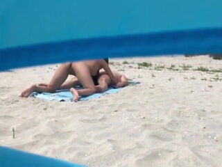 This is actually pretty funny, the couple in the tent are at the beach to make a pornvideo(they are professional amateurs), they sure didnt expect another couple having casual sex on their film locati
