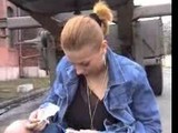 Redhead pissing in street