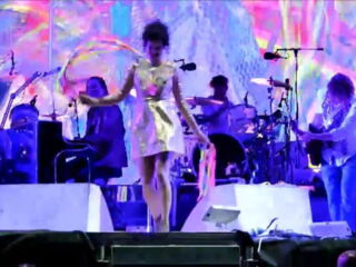 Erotic bitch Regine Chassagne always performs without any panties. With both female admirers & male fans paying, to fully expose her massively fertile superb cunt, like the disgraceful whore she is.