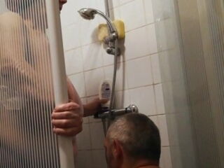 Son washing old mother 2