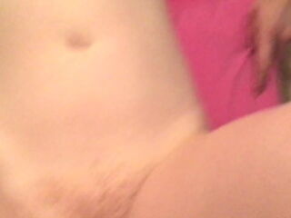 Ginger girl gets her ass slapped (while taking a cock on all fours), plays with her hairy pussy (while being fucked in missionary position), and swallows a nice load of cum